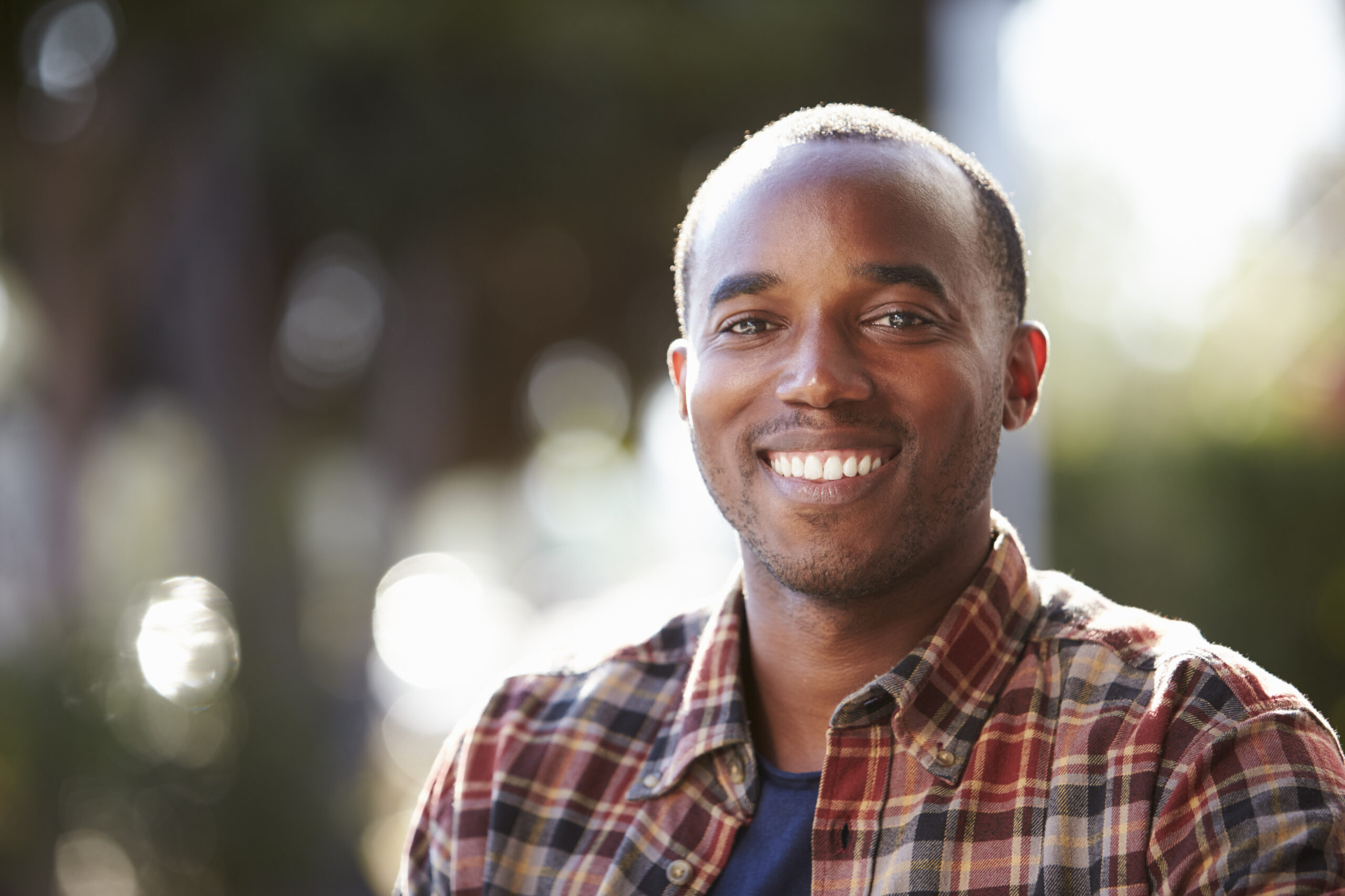 Happy young man outside