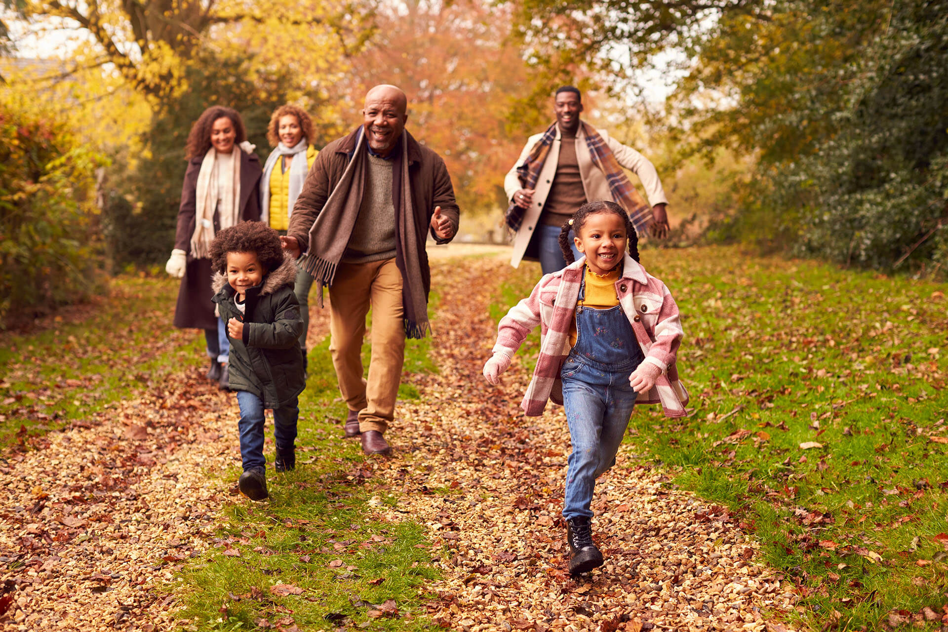 Multi-generational family outside in the Fall